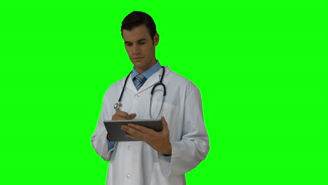 Young-doctor-using-his-tablet-pc