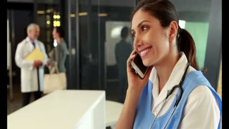 Smiling-doctor-on-phone-call