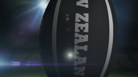 Pelota-De-Rugby-De-Nueva-Zelanda-En-El-Estadio-Con-Luces-Intermitentes-