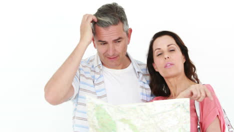 Smiling-lost-couple-looking-at-map