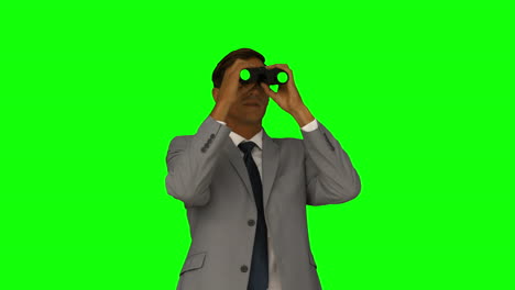 Businessman-looking-through-binoculars