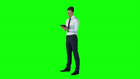 Businessman-using-tablet-computer-