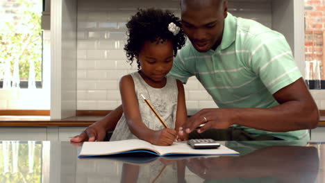 Father-helping-his-daughter-with-homework
