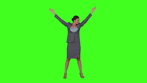 Businesswoman-standing-with-arms-raised