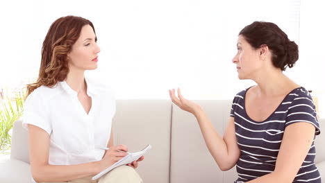 Depressed-woman-talking-with-her-therapist