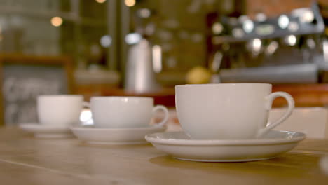 Cups-and-saucers-on-cafe-table