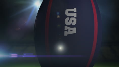 Pelota-De-Rugby-De-EE.UU.-En-El-Estadio-Con-Luces-Intermitentes-