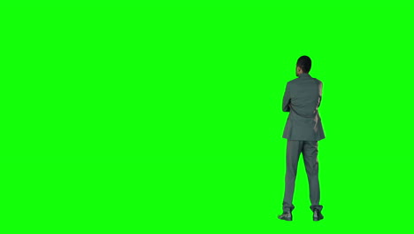 Businessman-pointing-on-a-green-screen