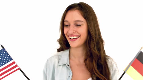 Smiling-woman-holding-flags