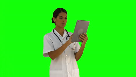 Nurse-using-her-tablet-pc-