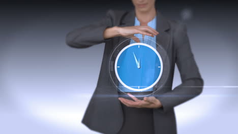 Businesswoman-holding-virtual-alarm-clock