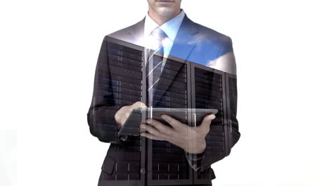 Businessman-using-tablet-computer-with-data-server-overlay