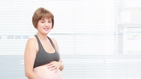 Pregnant-woman-sitting-on-an-exercise-ball