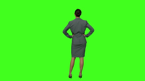 Businesswoman-standing-with-hands-on-hips