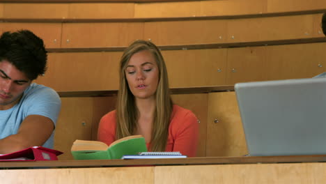 Students-sitting-beside-each-other-while-learning