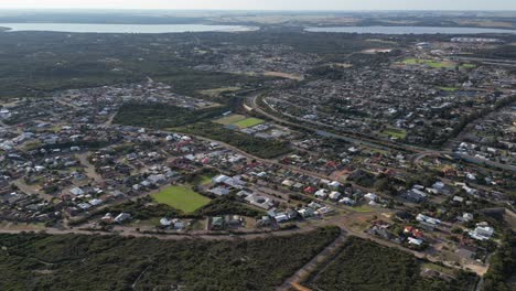 Bird's-eye-view-of-Esperance-Town-in-Western-Australia,-aerial-drone-orbital