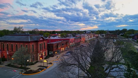 Drone-shot-of-downtown-Sandwich,-IL,-filmed-at-sunset