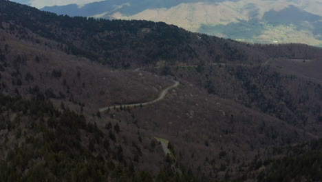 Aerial-view-following-Blue-Ridge-Parkway-through-rugged-Appalachian-Mountains