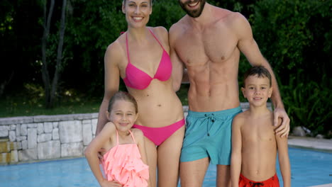 Cute-family-smiling-and-posing