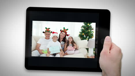 Animated-tablet-computer-displaying-videos-about-family-celebrating