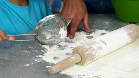 Children-preparing-a-cake