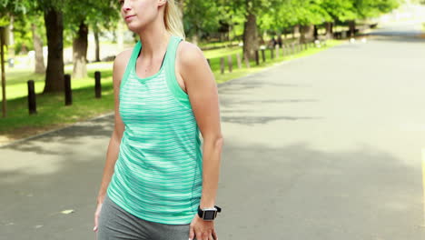 Fit-woman-stretching-in-the-park