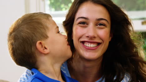 Mom-giving-a-kiss-to-his-son