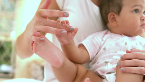 Baby-daughter-holding-mothers-finger