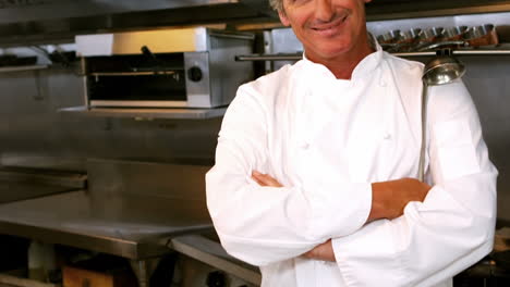 Portrait-of-chef-posing-in-commercial-kitchen
