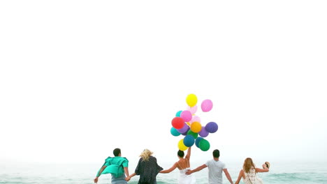 Friends-running-with-balloons