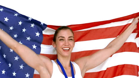 Happy-athlete-holding-American-flag