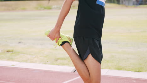 Focused-sportsman-stretching
