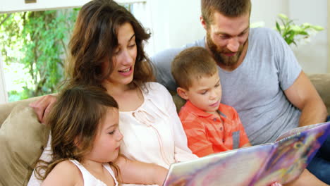 Family-reading-a-children-book