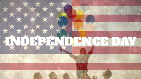 Animation-of-independence-day-text,-flag-of-america,-diverse-friends-with-balloons-enjoying-at-beach
