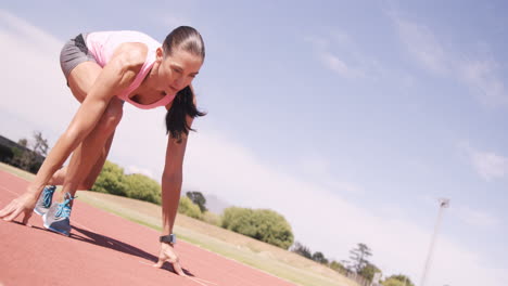 Focused-sportswoman-running