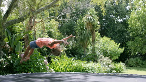 Blonde-girl-jumping-on-trampoline