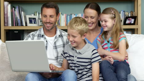 A-happy-family-is-using-a-computer