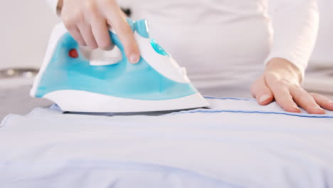 Close-up-on-a-woman-doing-the-ironing-