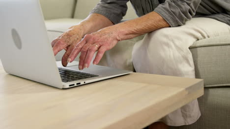 Senior-woman-typing-on-her-computer