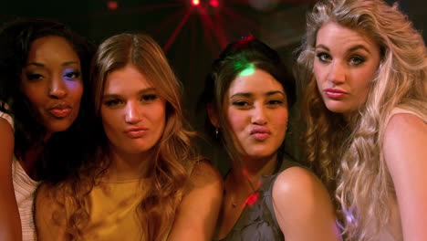 Group-of-friends-doing-duck-face-at-the-camera