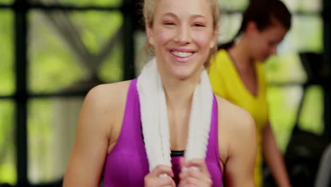 Happy-blonde-woman-smiling-to-camera