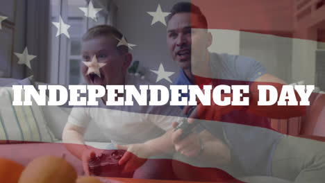 Animation-of-independence-day-text-over-caucasian-father-and-son-playing-video-game-at-home