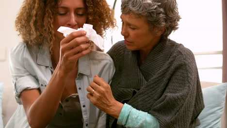 Woman-taking-care-of-her-sad-friend