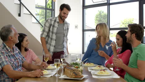 Friends-interacting-while-having-a-meal