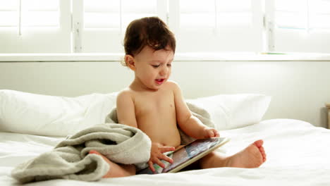 Baby-playing-with-a-tablet