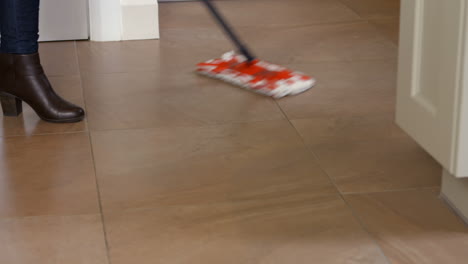 Woman-using-the-mop-for-cleaning