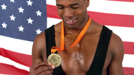Man-holding-medal