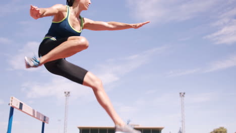 Woman-practicing-hurdle-race
