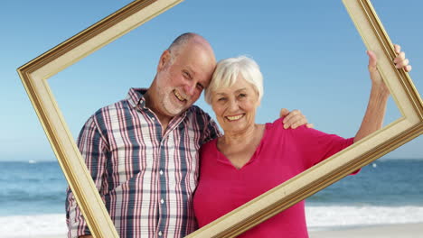 Senior-couple-holding-frame