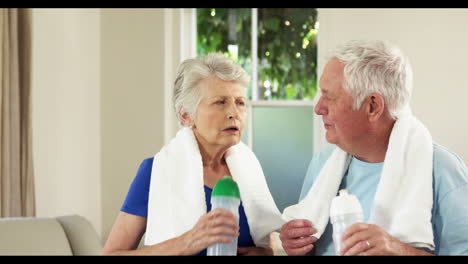 Senior-couple-drinking-water-